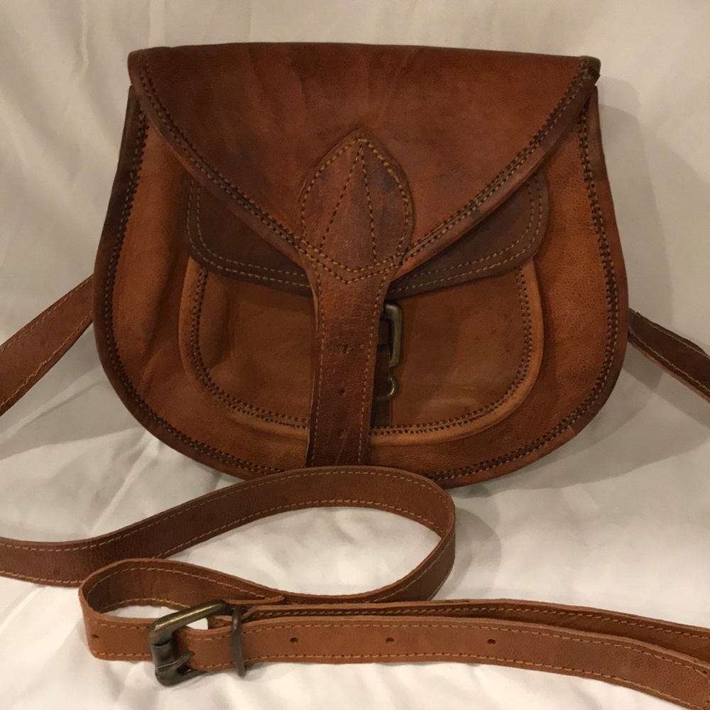 Small leather crossbody bag with Oklahoma button